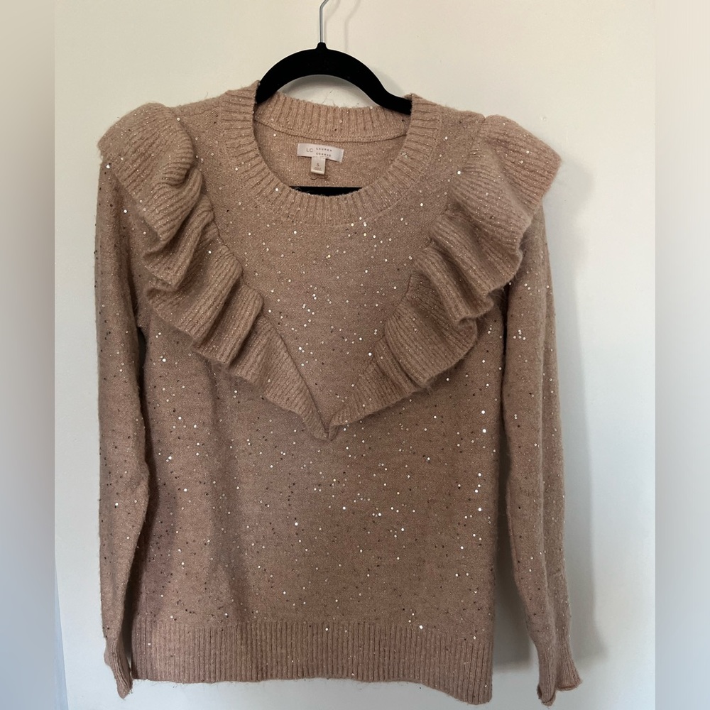 Subtle Sparkles on a frilly sweater from Lauren Conrad’s brand!